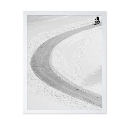 Lone Cyclist in Snow