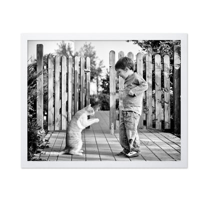 Boy Playing With Cat