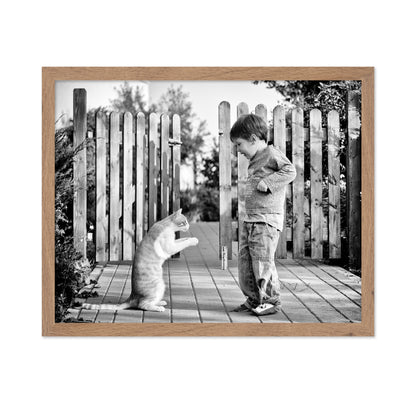 Boy Playing With Cat