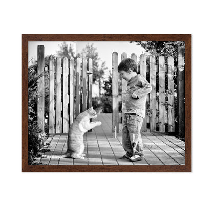 Boy Playing With Cat