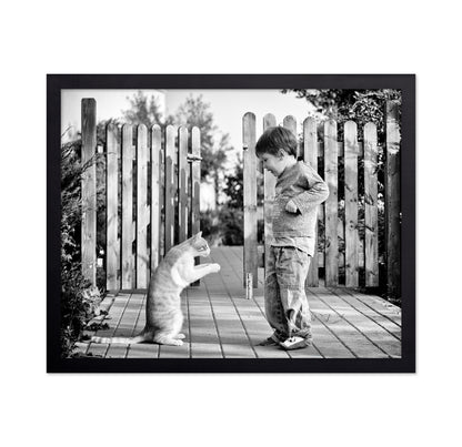 Boy Playing With Cat