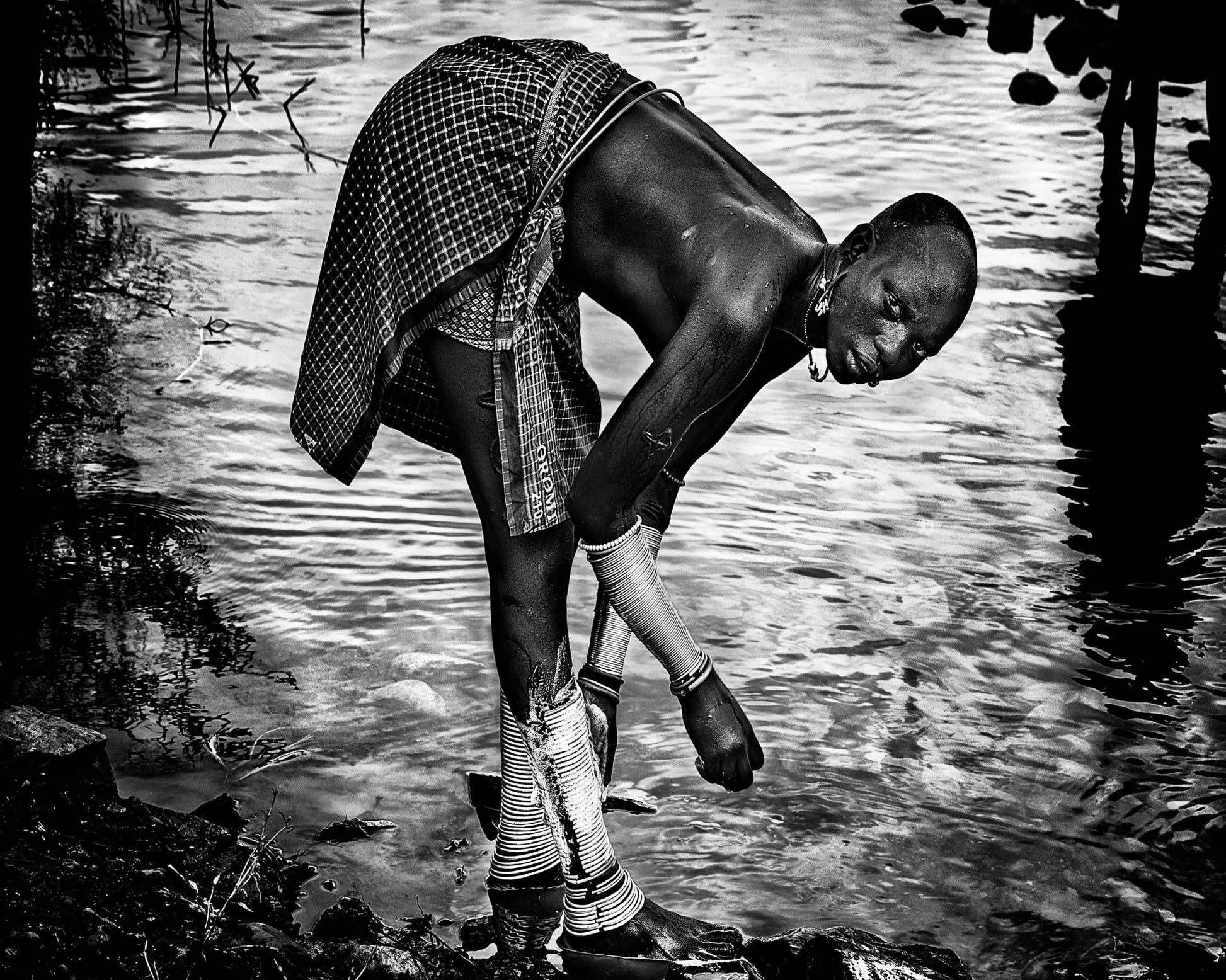 Surma Tribe Woman Washing Up Her Jewelry