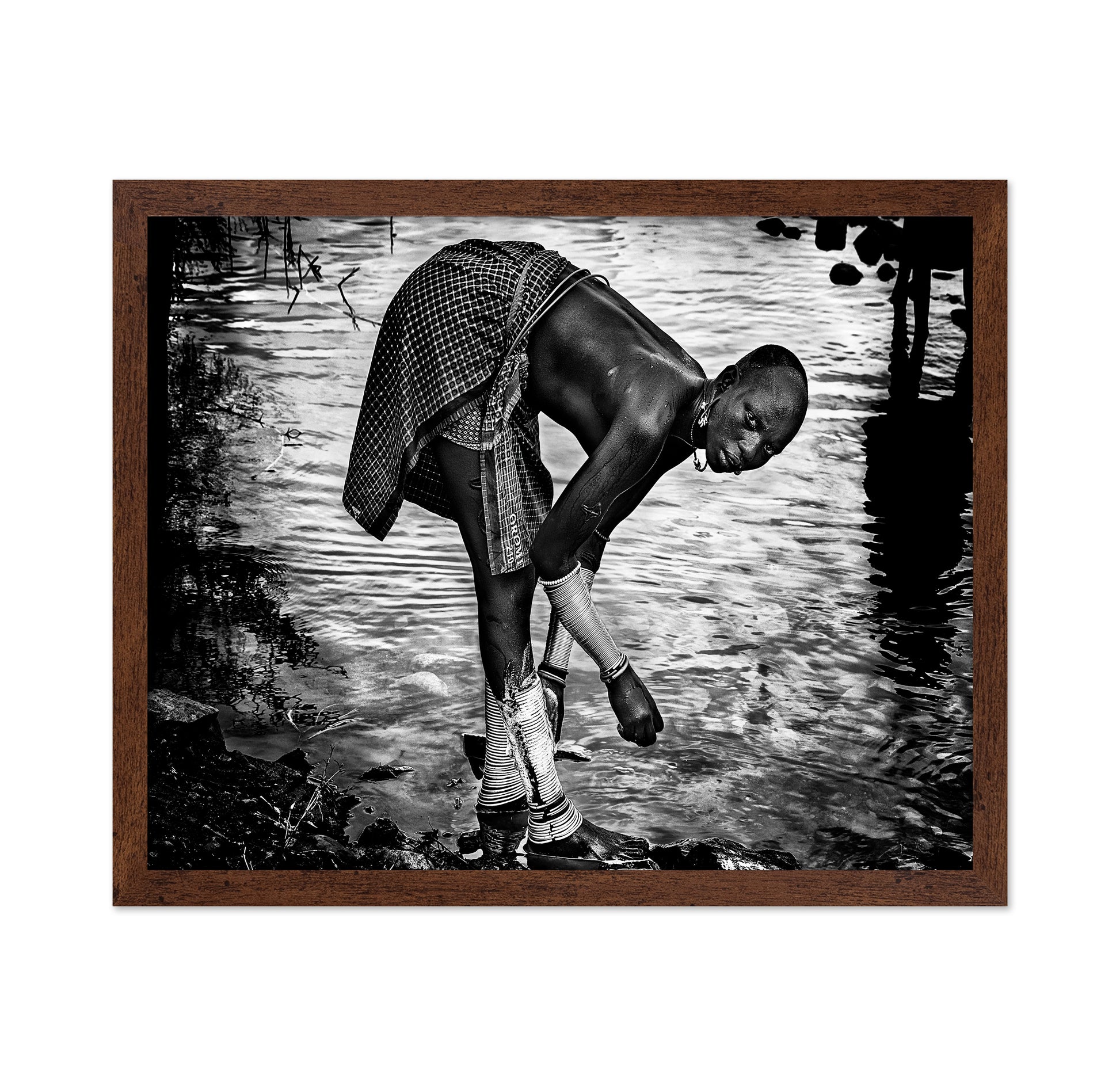 Surma Tribe Woman Washing Up Her Jewelry