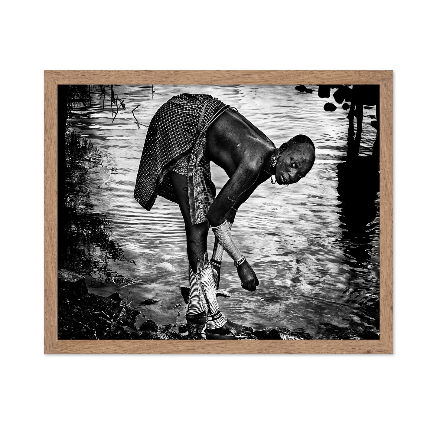 Surma Tribe Woman Washing Up Her Jewelry