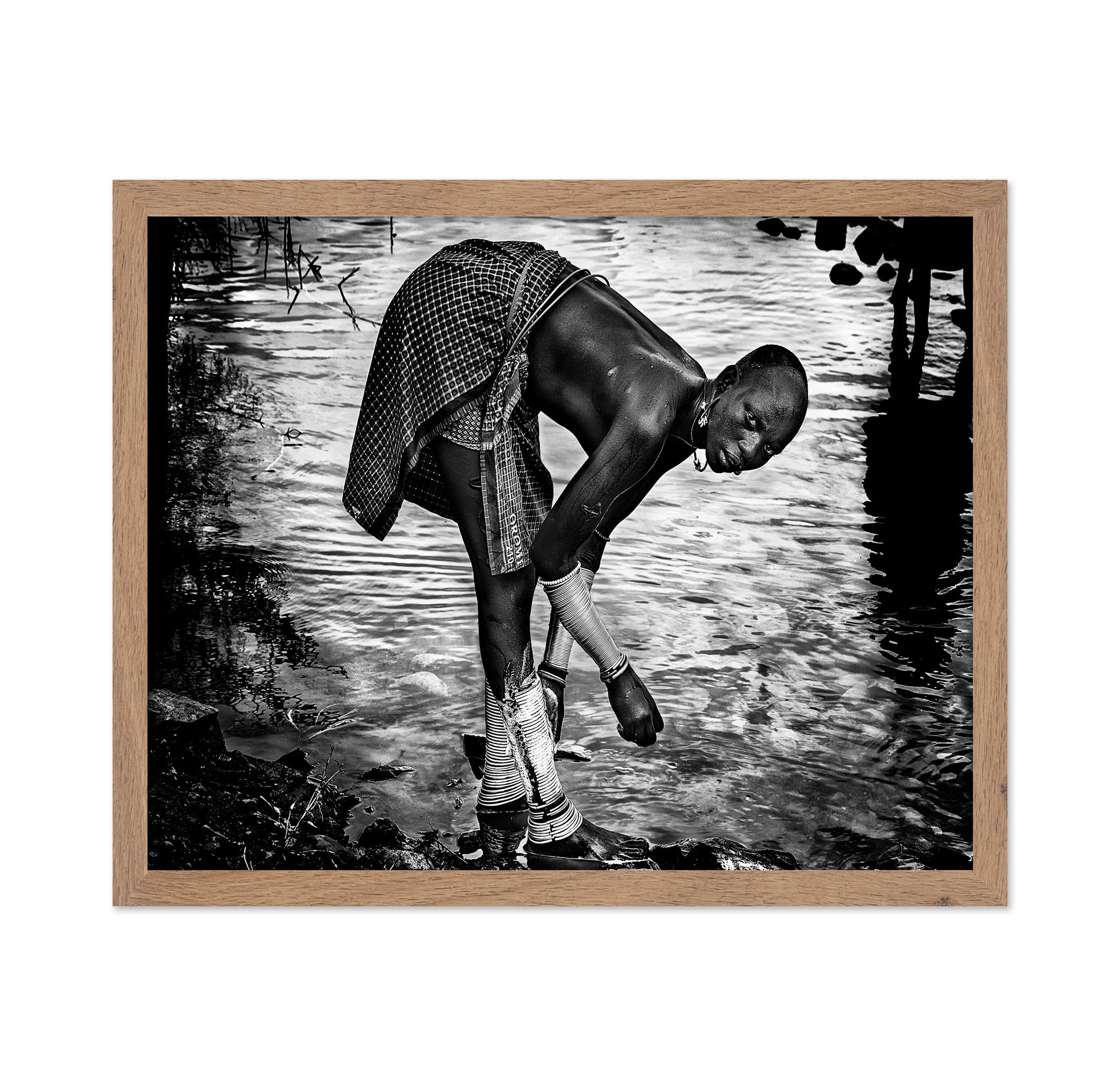 Surma Tribe Woman Washing Up Her Jewelry