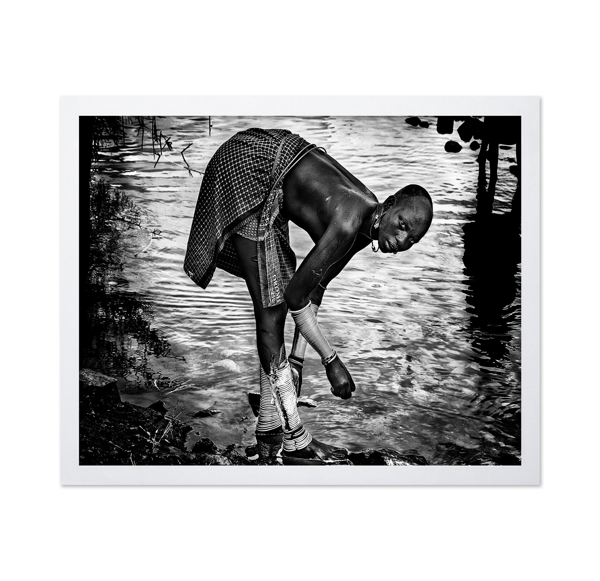 Surma Tribe Woman Washing Up Her Jewelry