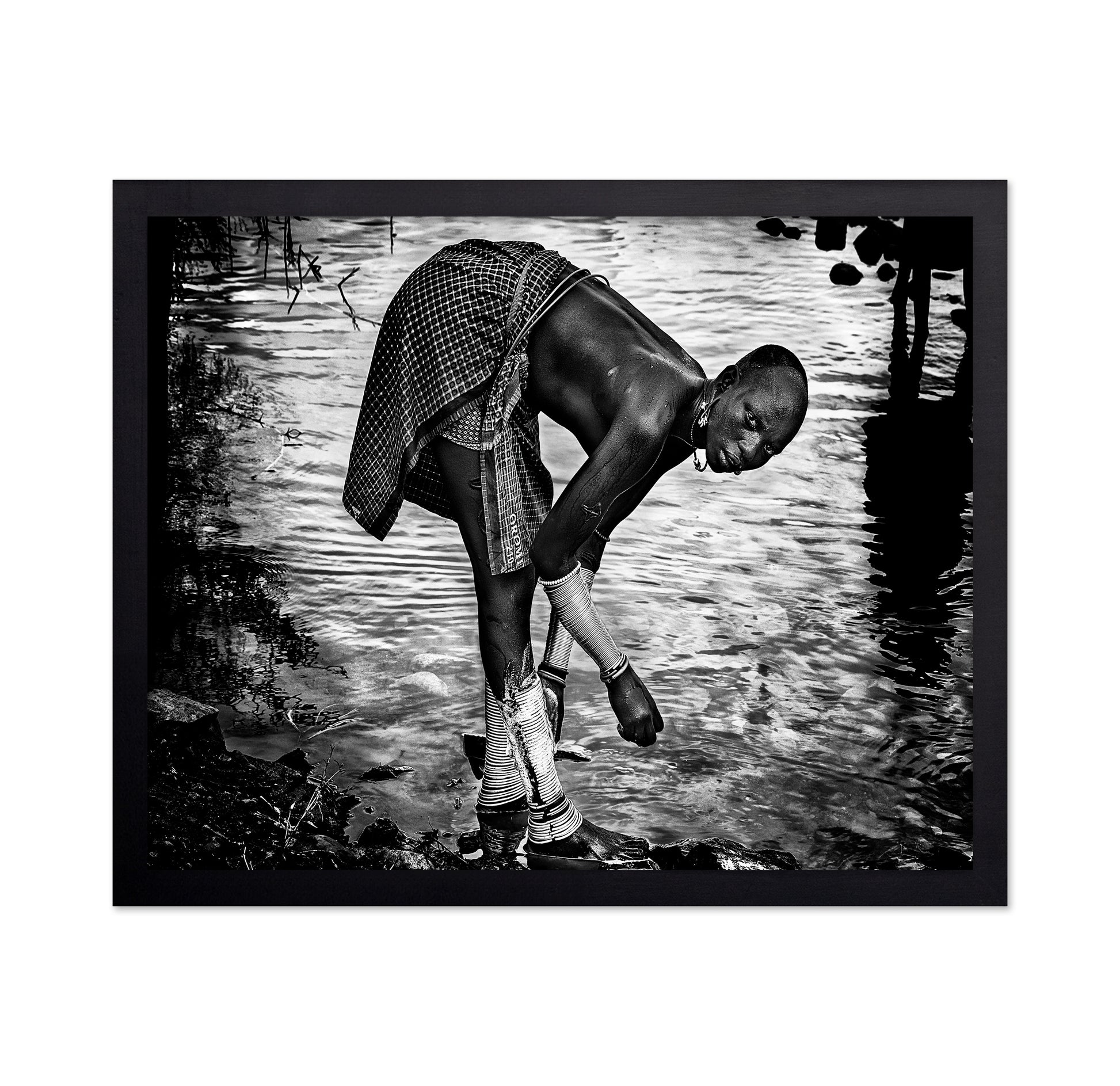 Surma Tribe Woman Washing Up Her Jewelry