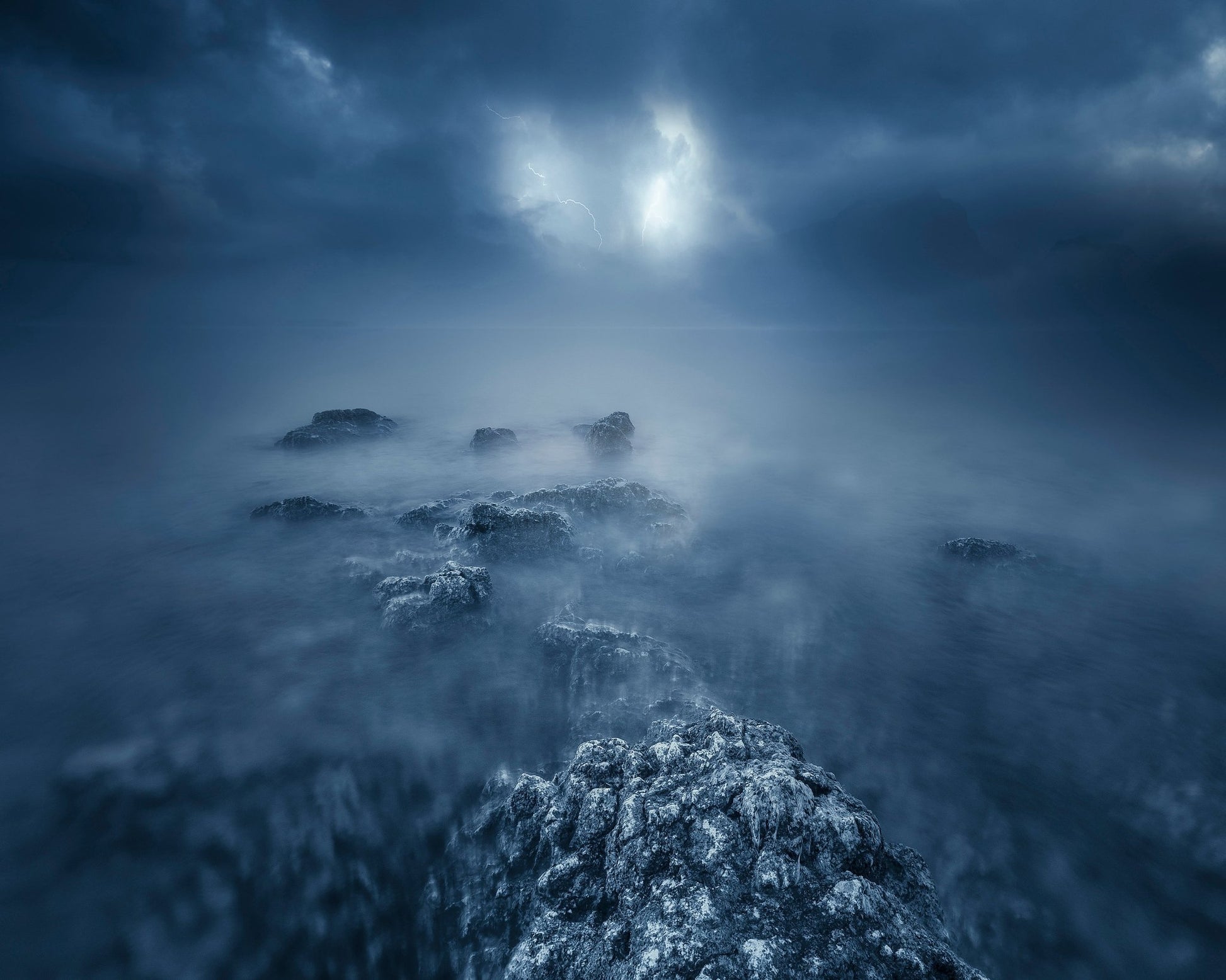 Rocks in Atlantic Ocean at Night