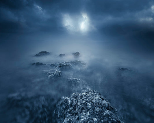 Rocks in Atlantic Ocean at Night