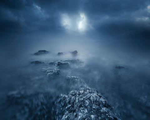 Rocks in Atlantic Ocean at Night
