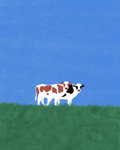 Cows In The Grass