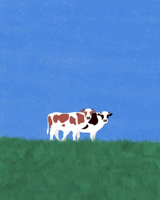 Cows In The Grass