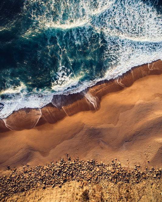 Vibrant Coastline With Turquoise Waves