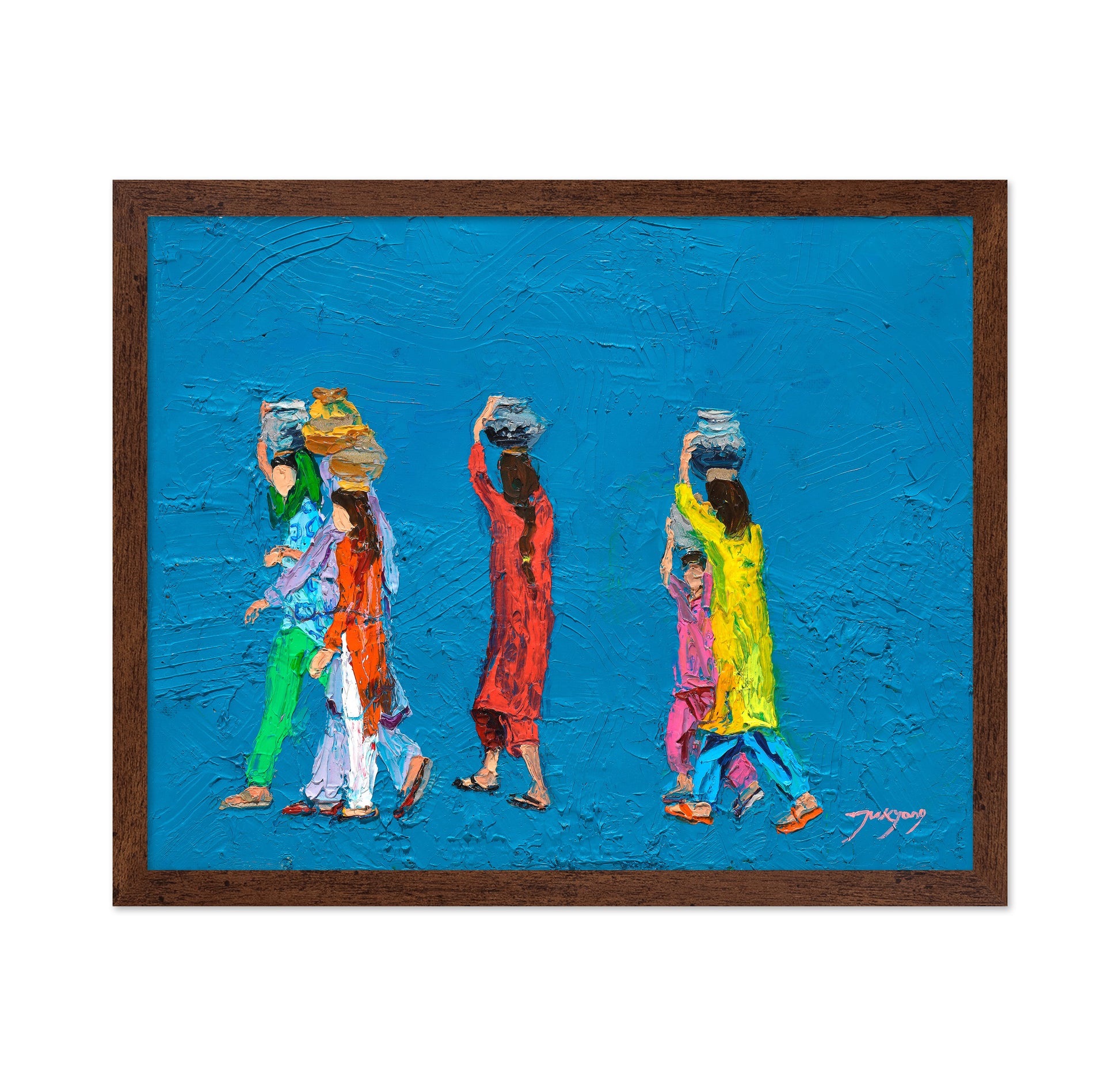 Women Walking With Baskets on Their Heads