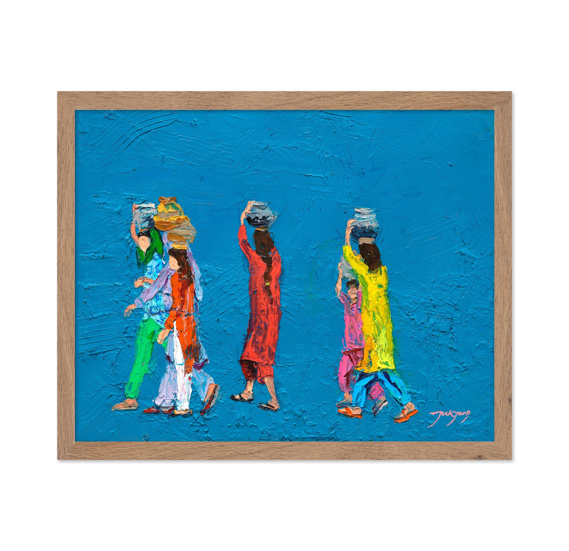 Women Walking With Baskets on Their Heads