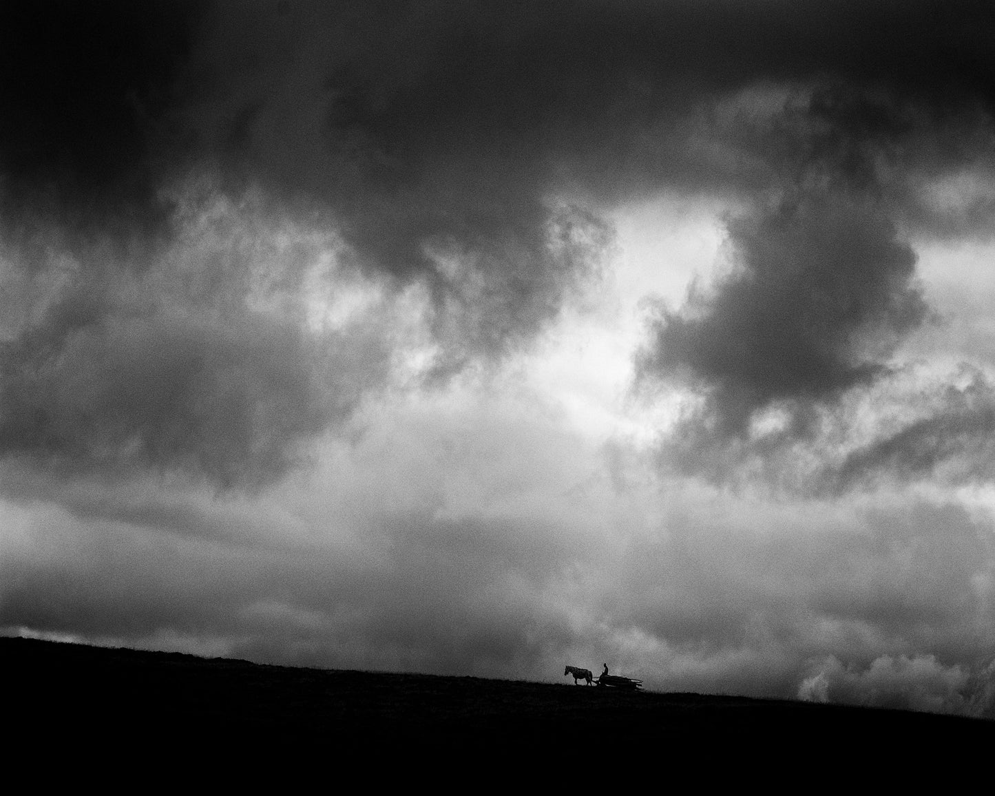 Lone Rider Under Storm