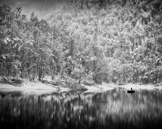 Solitary Boat in Winter Lake