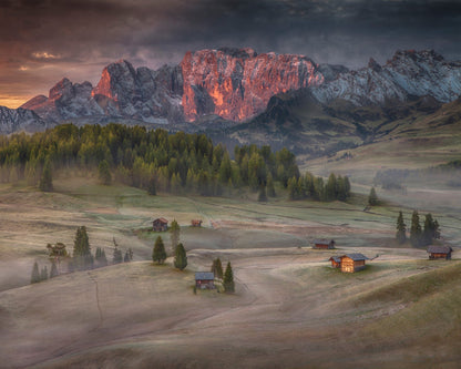 Glowing Peaks Above Alpine Village