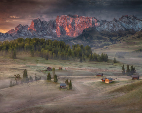 Glowing Peaks Above Alpine Village