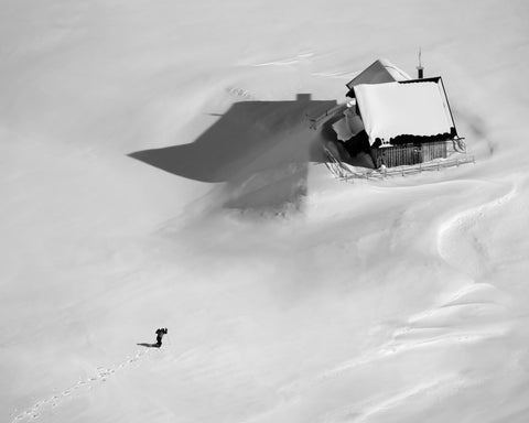 Lone Cabin in Endless Snow
