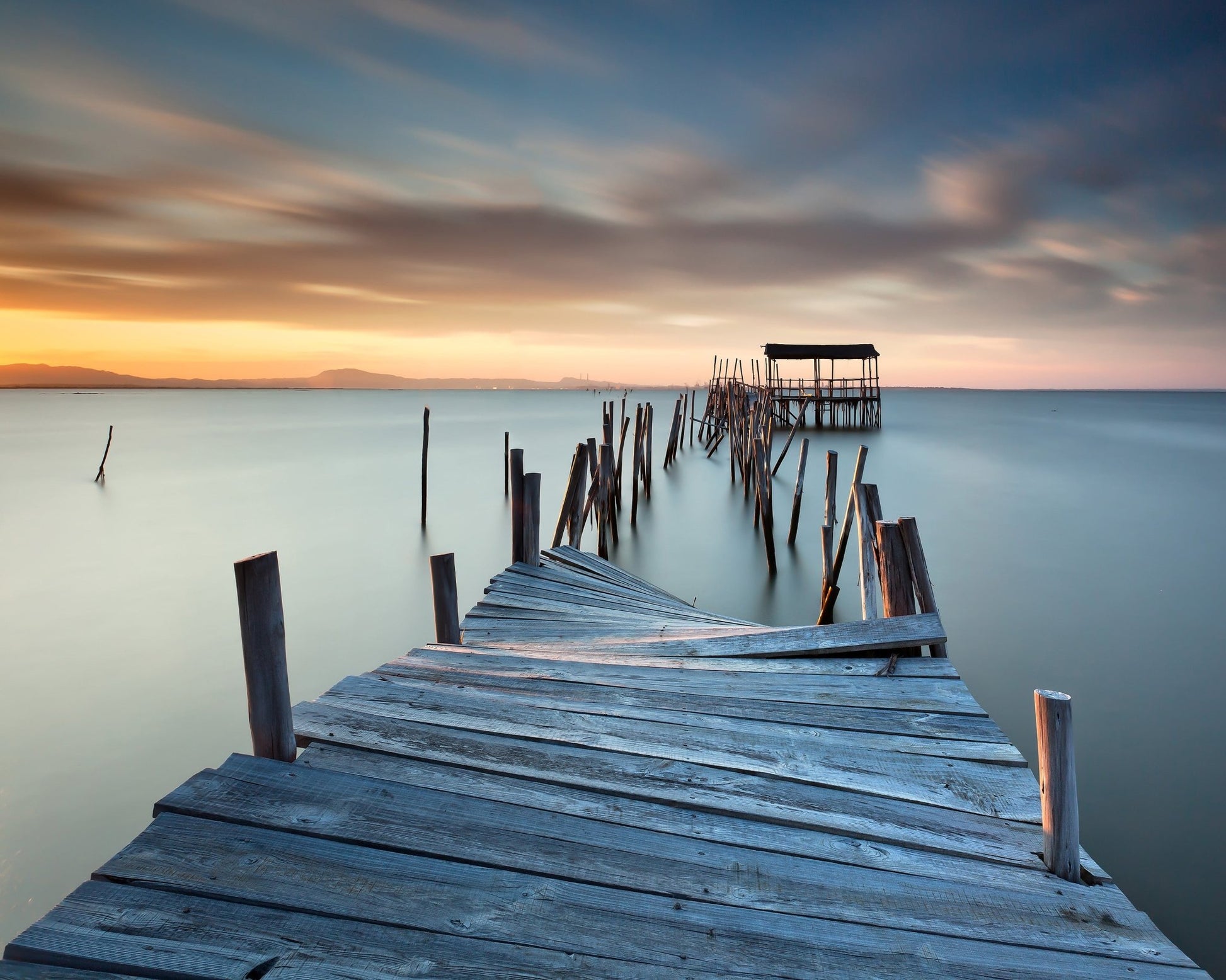 Broken Pier At Sunset