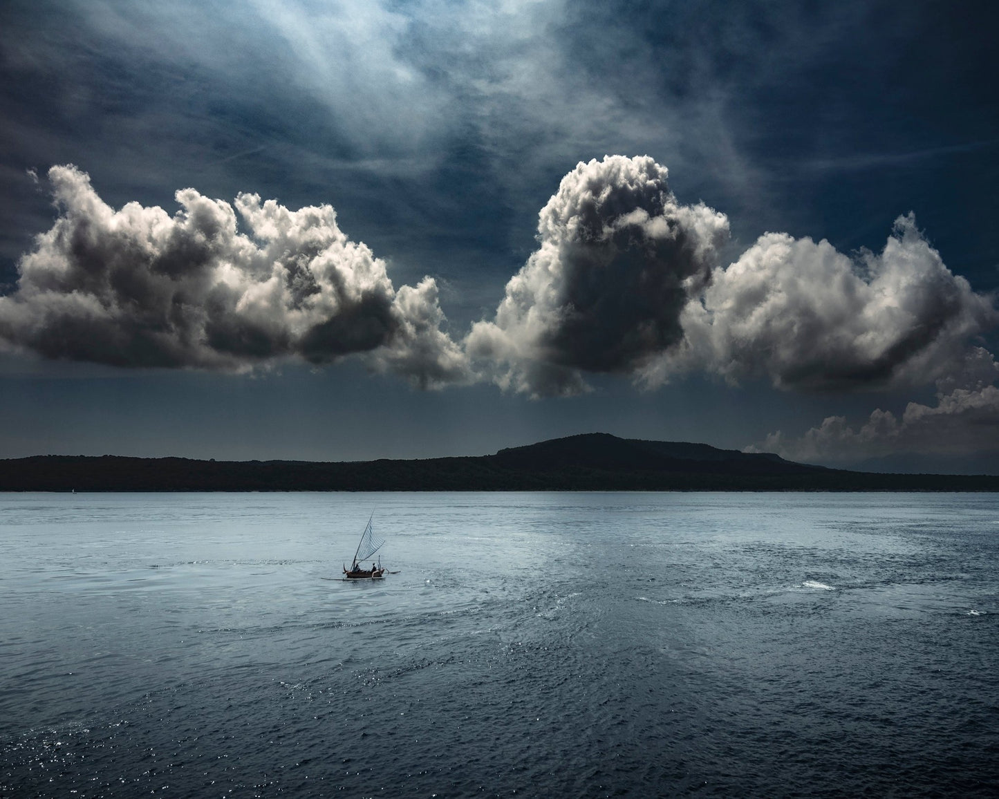 Lone Boat On Ocean