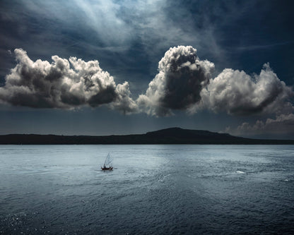 Lone Boat On Ocean
