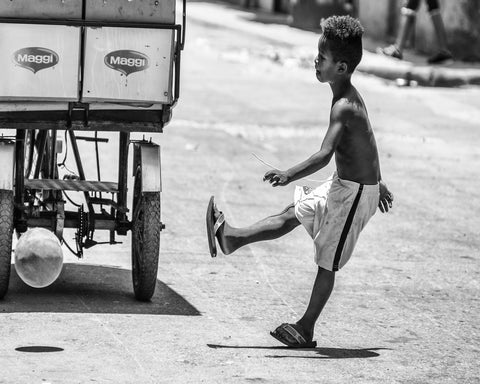 Boy Kicking Ball