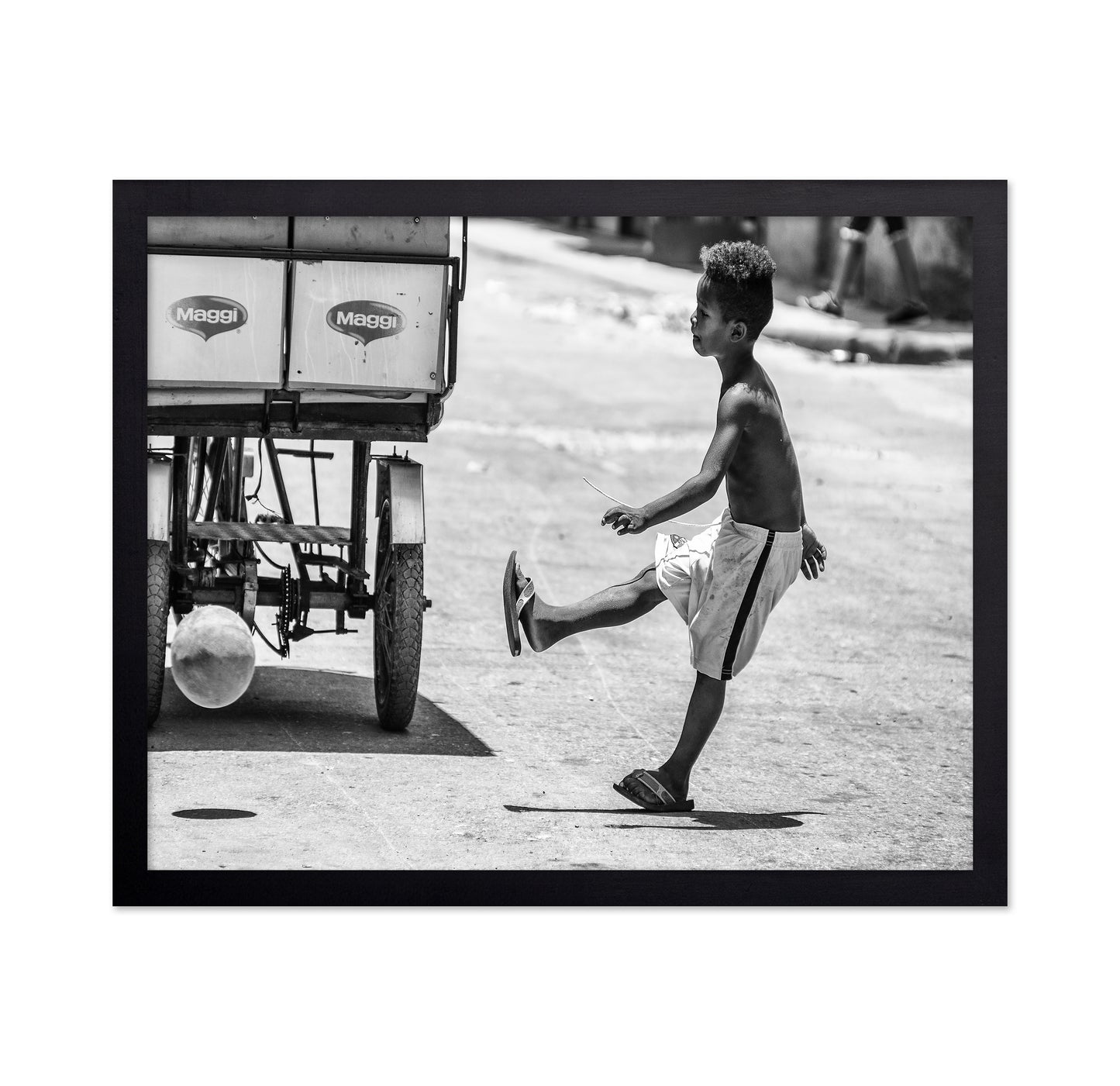 Boy Kicking Ball