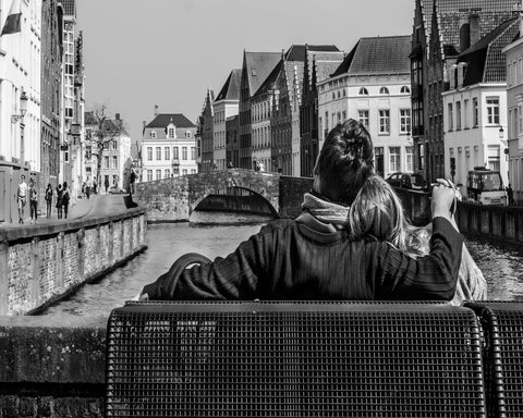 Couple by Canal in Bruges