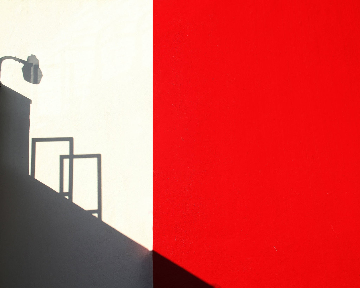 Minimal Red Wall Shadow Composition