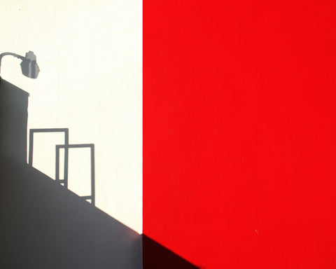 Minimal Red Wall Shadow Composition