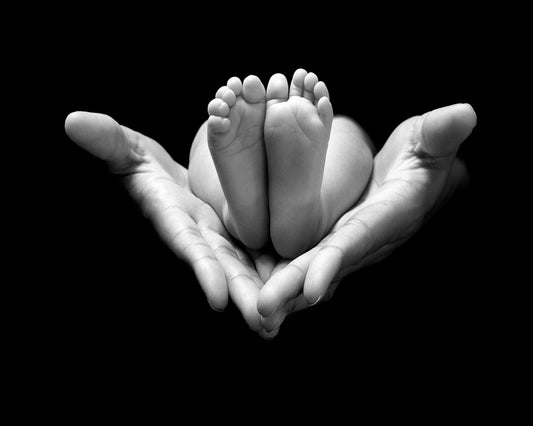 Tiny Feet In Hands