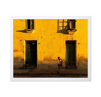 Boy Running Past Wall