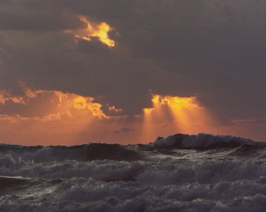 Golden Rays Over Waves