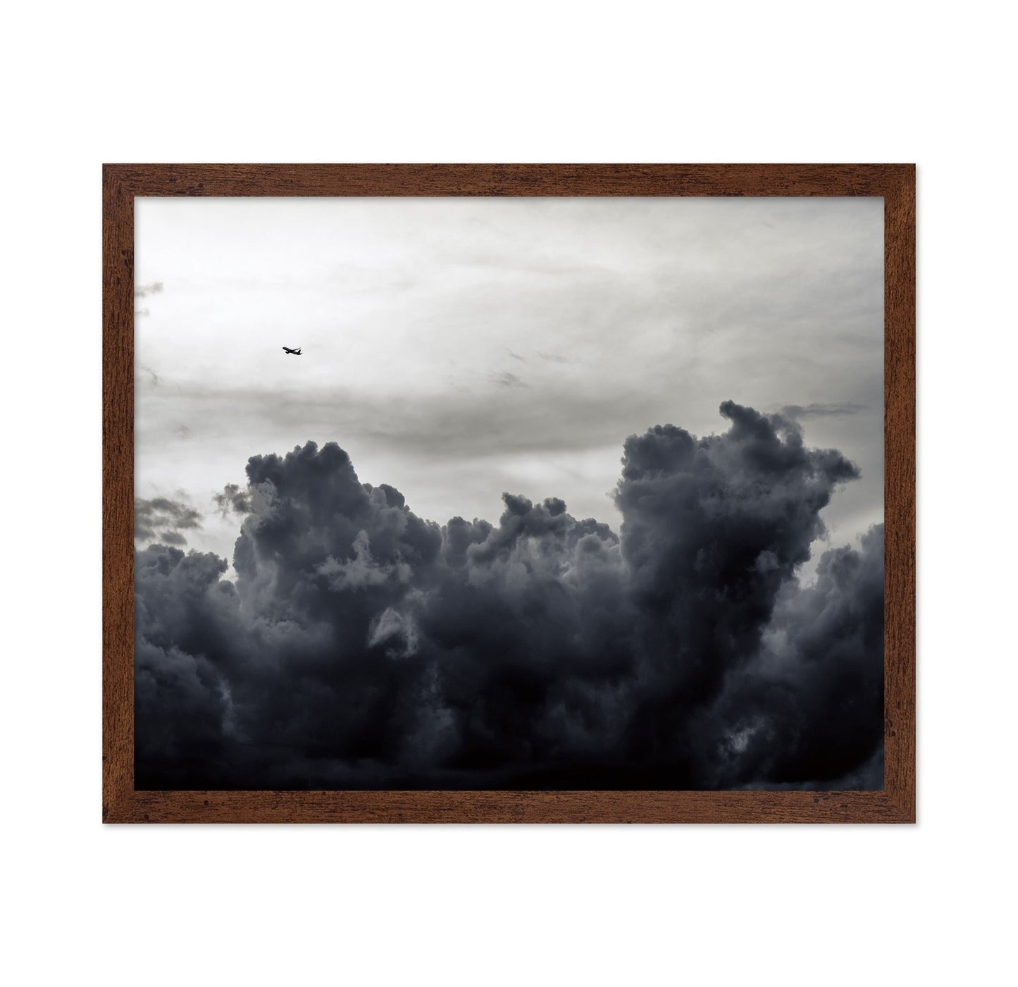 Plane Above Storm Clouds