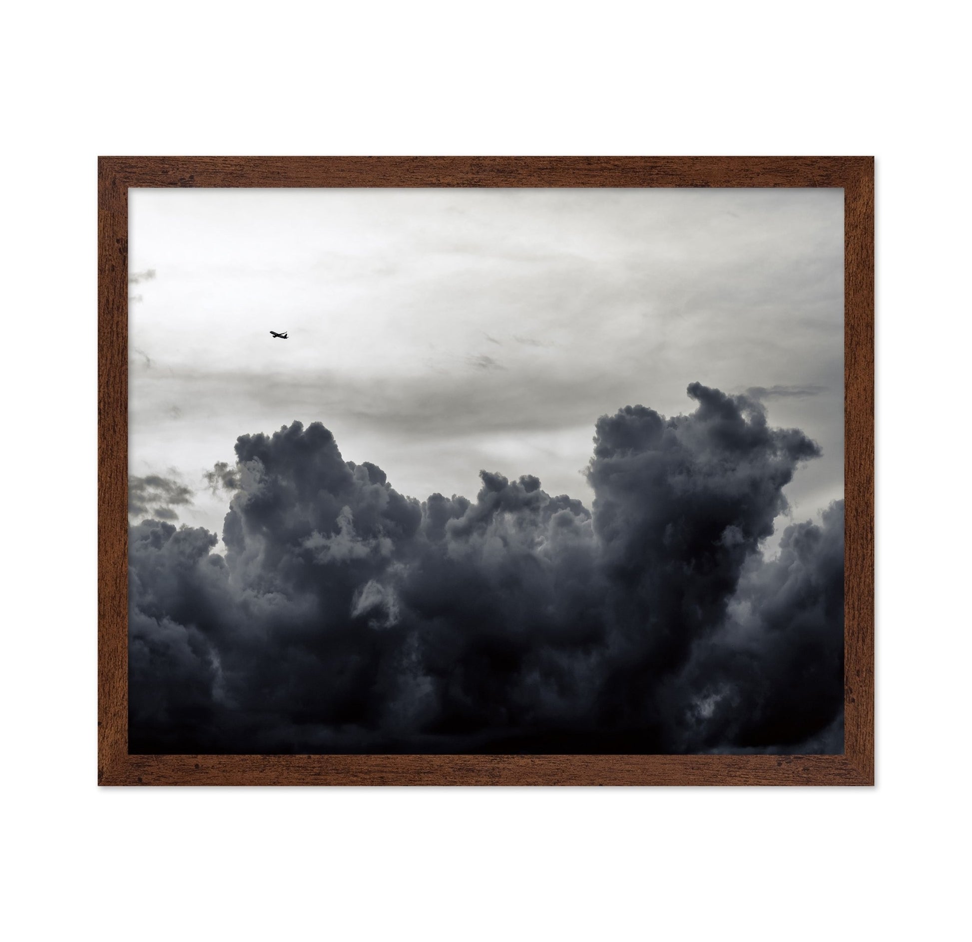 Plane Above Storm Clouds