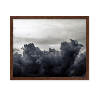 Plane Above Storm Clouds