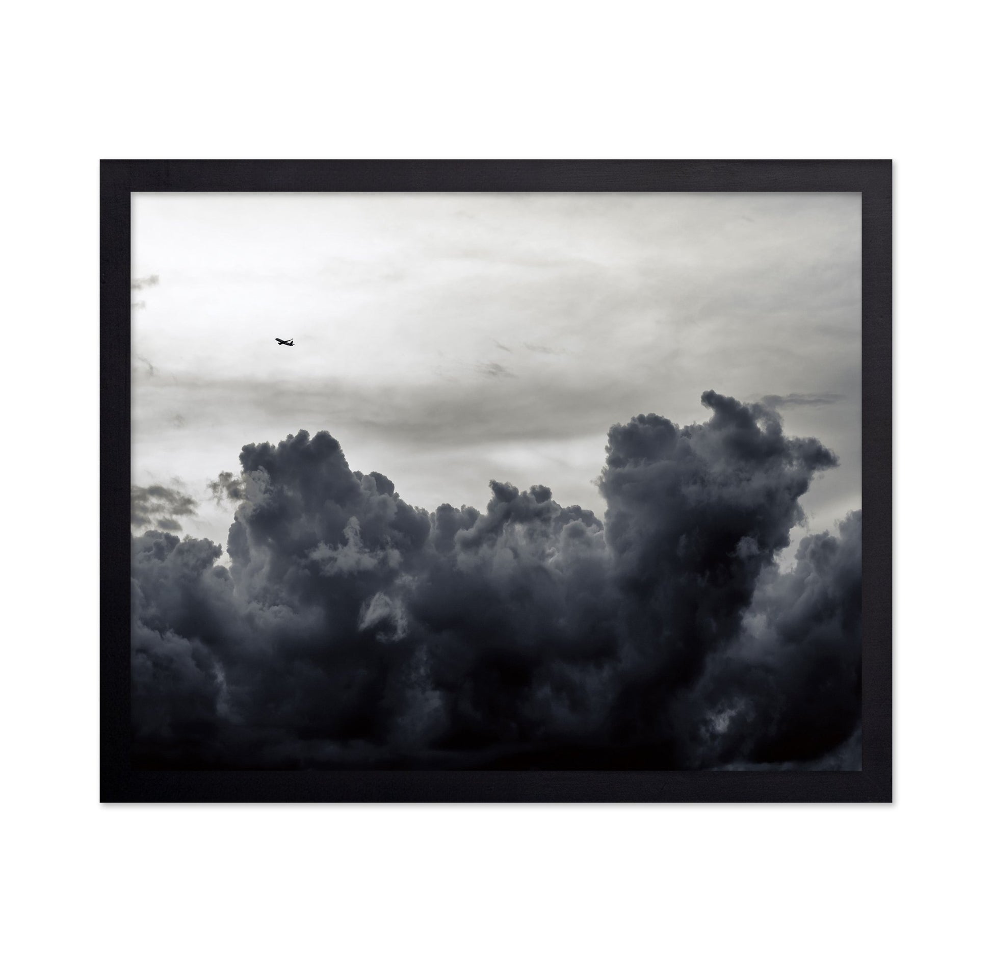 Plane Above Storm Clouds