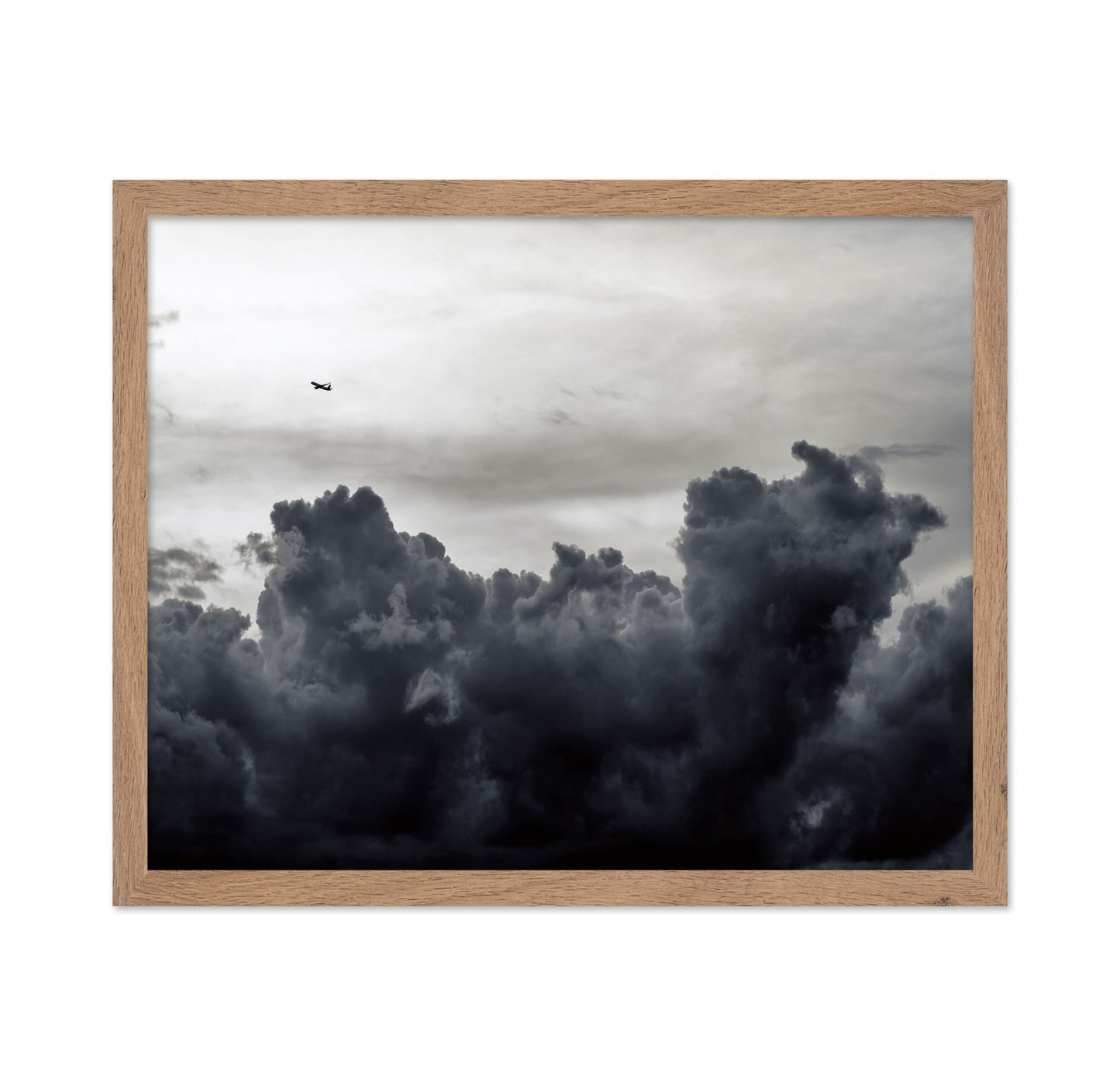 Plane Above Storm Clouds