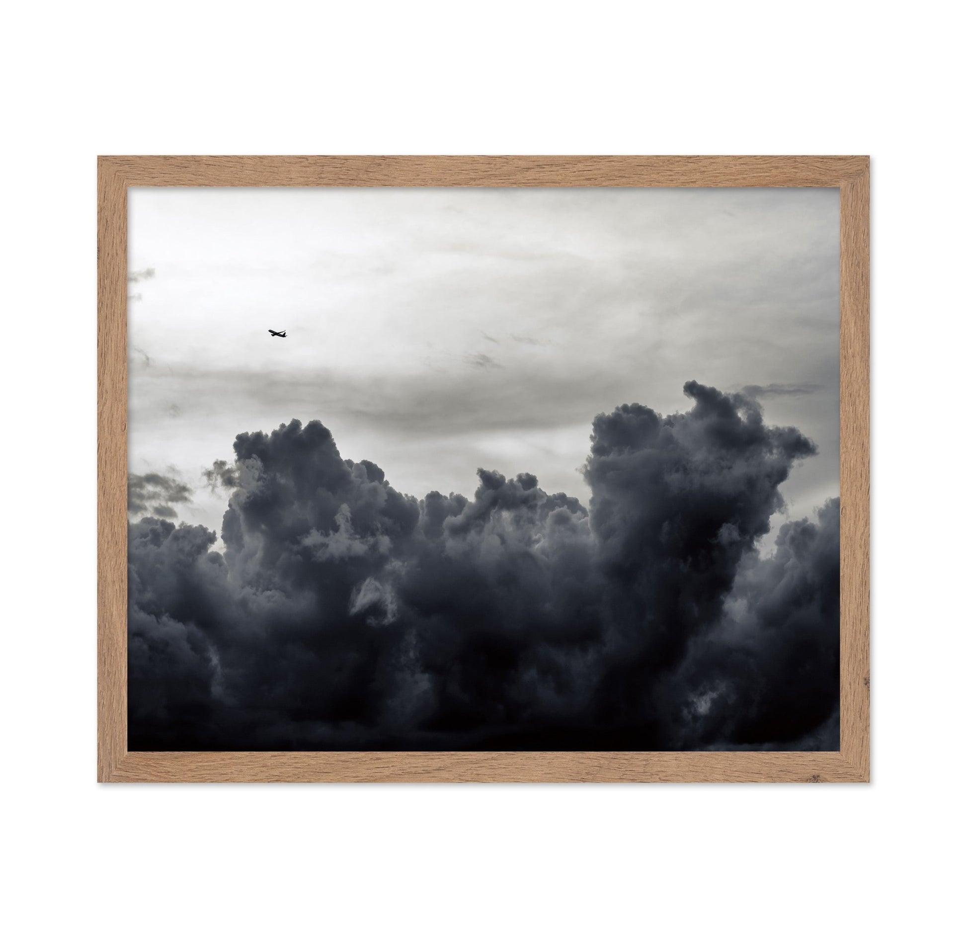 Plane Above Storm Clouds