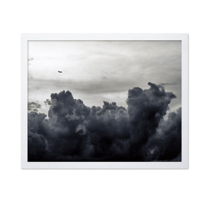Plane Above Storm Clouds