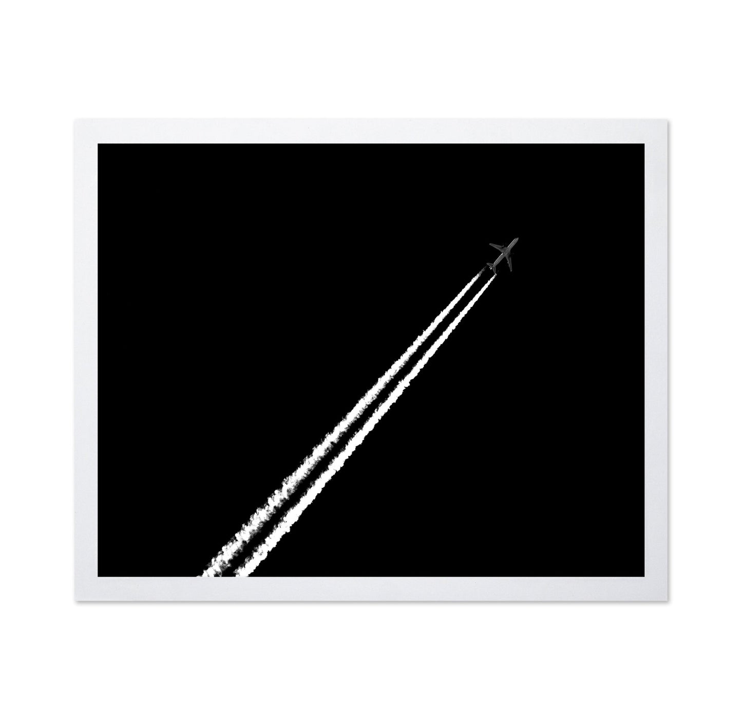 Jet Trail In Black Sky