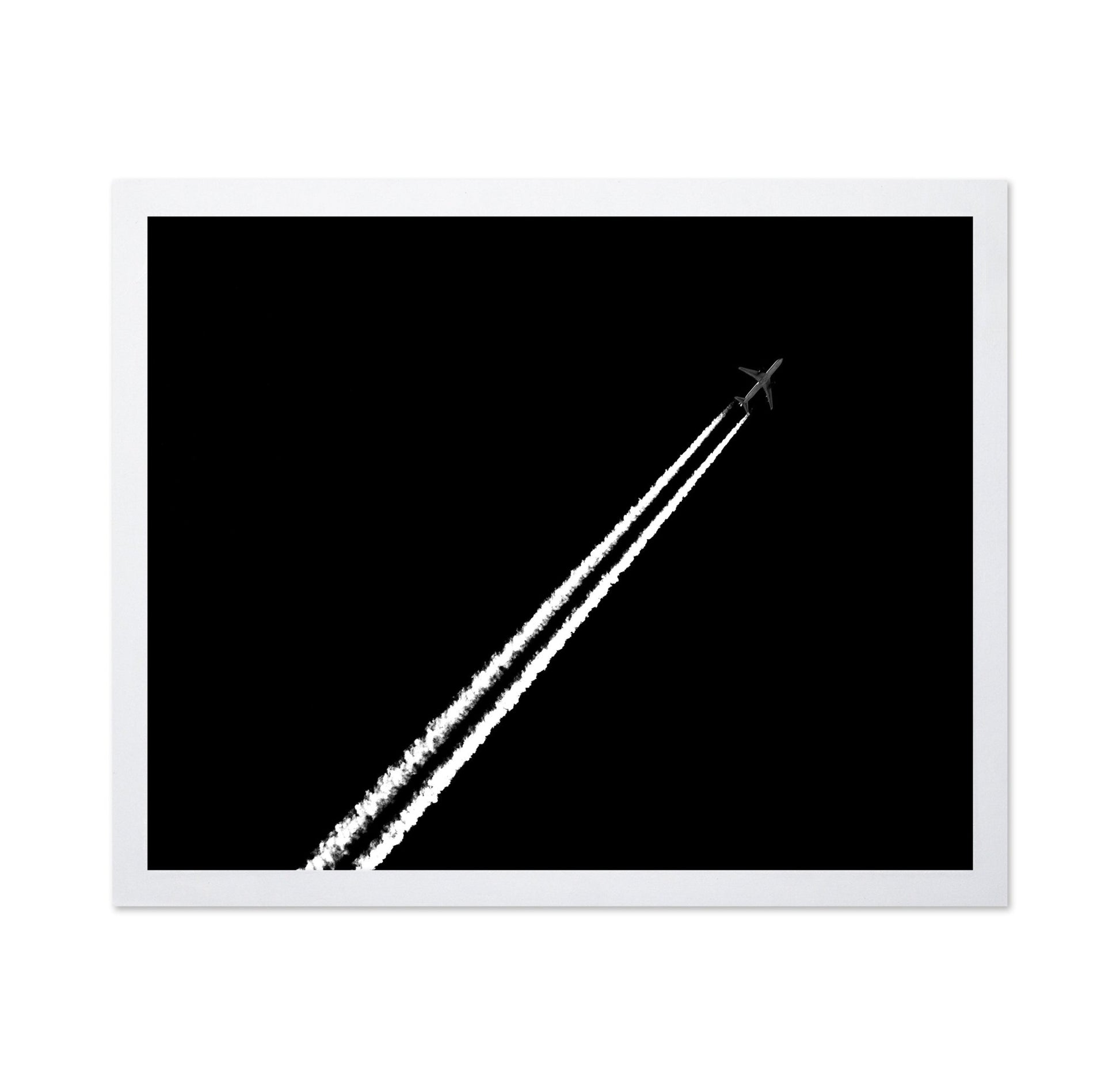 Jet Trail In Black Sky