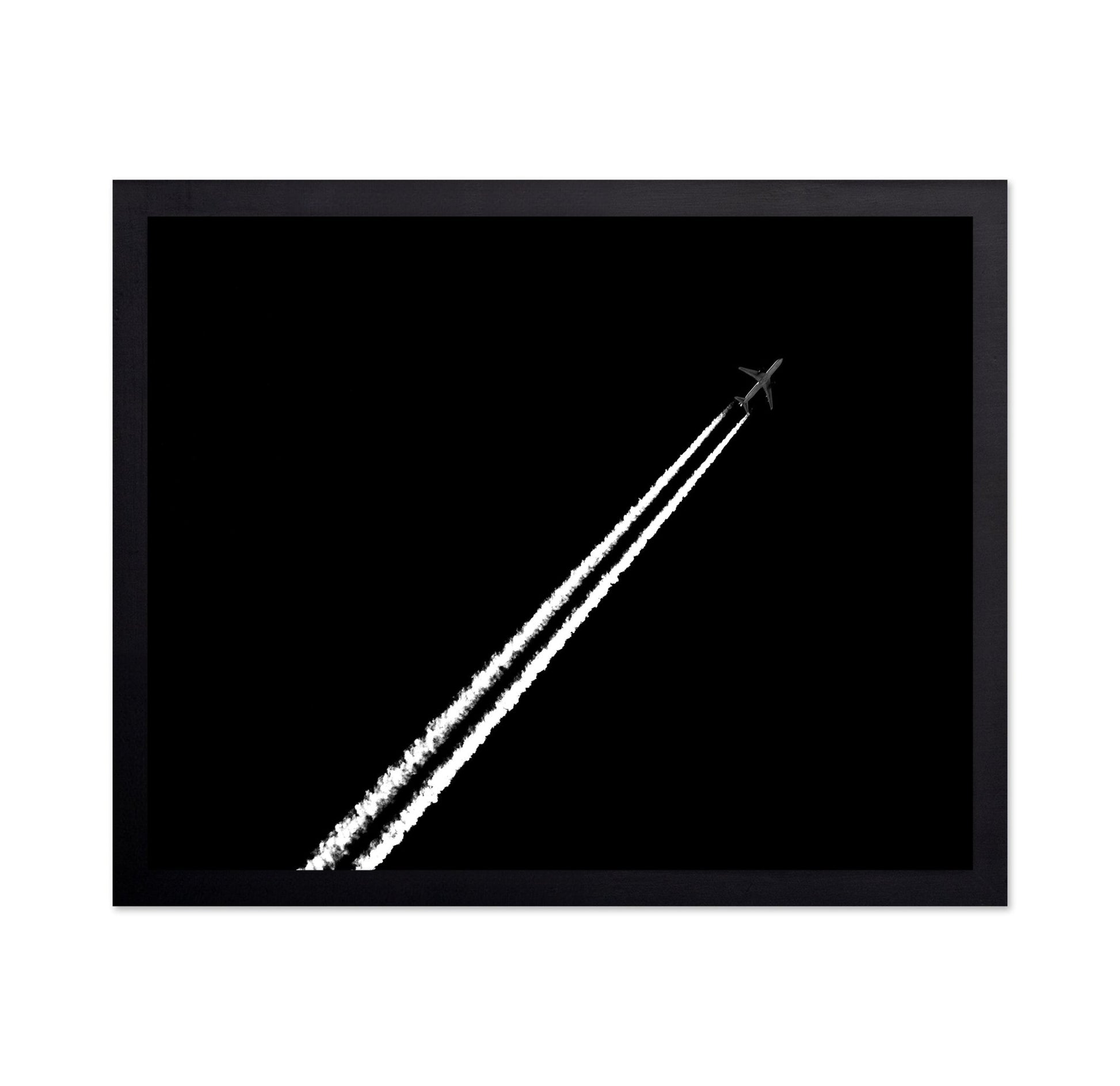 Jet Trail In Black Sky