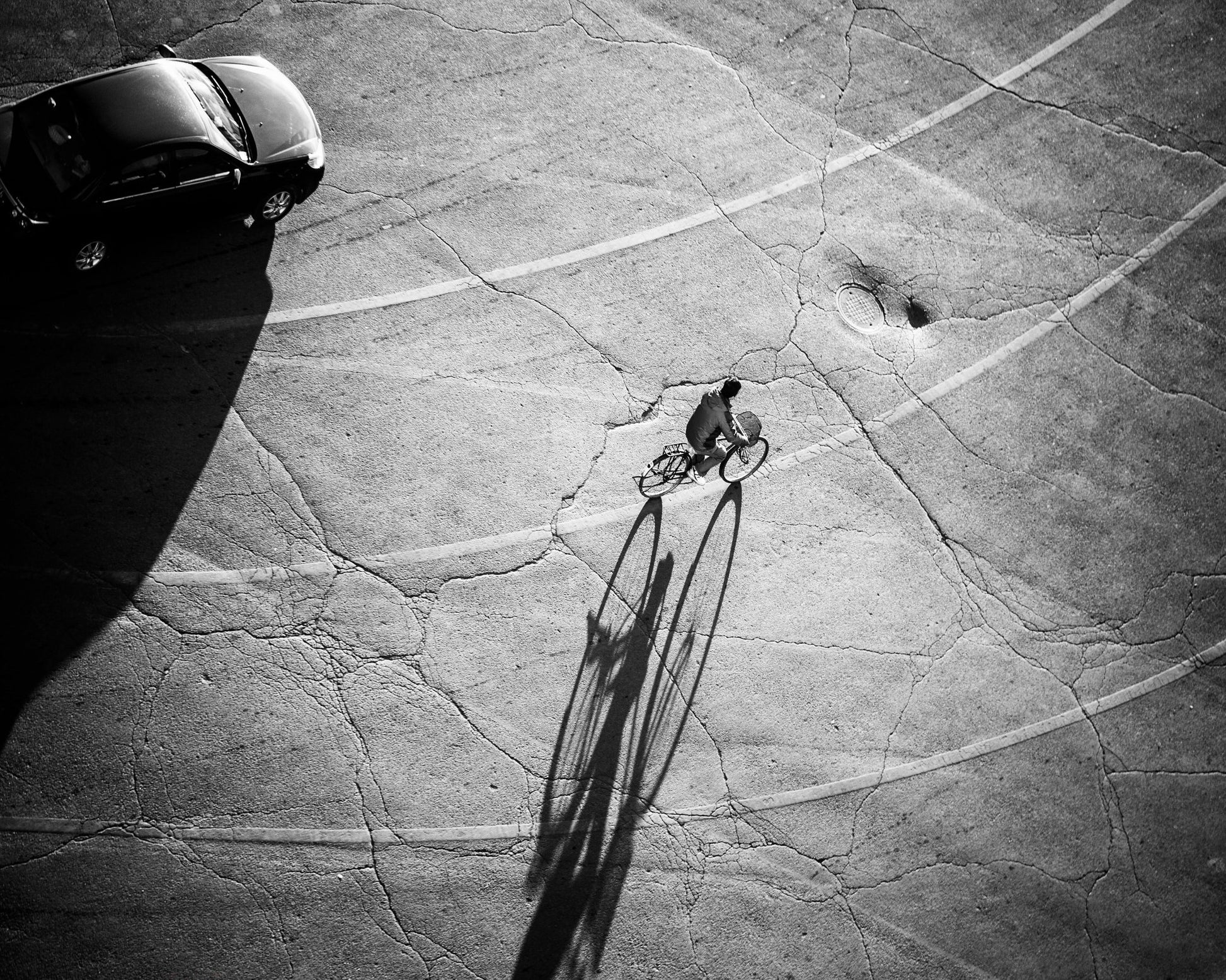 Lone Cyclist Shadow