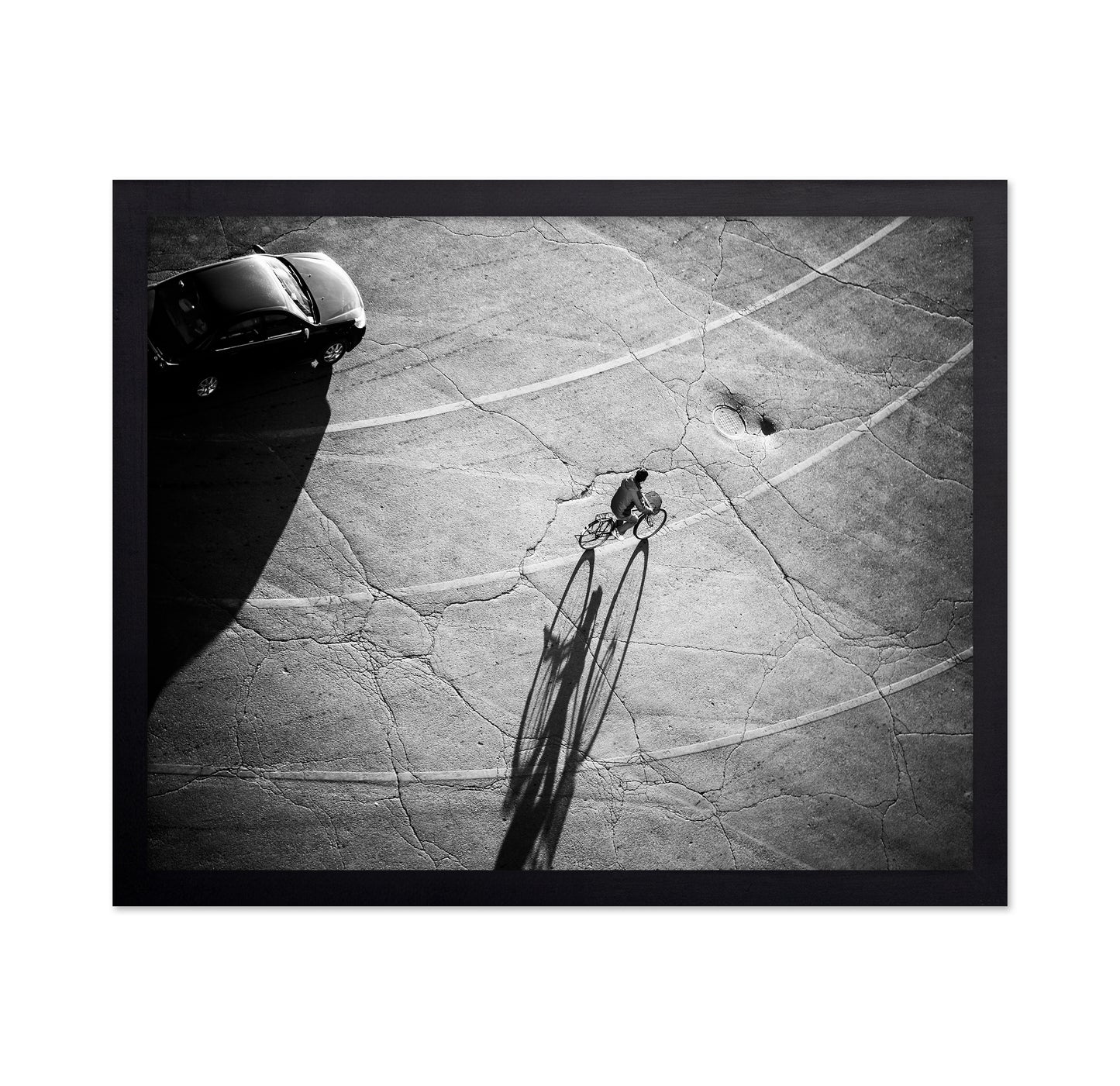 Lone Cyclist Shadow