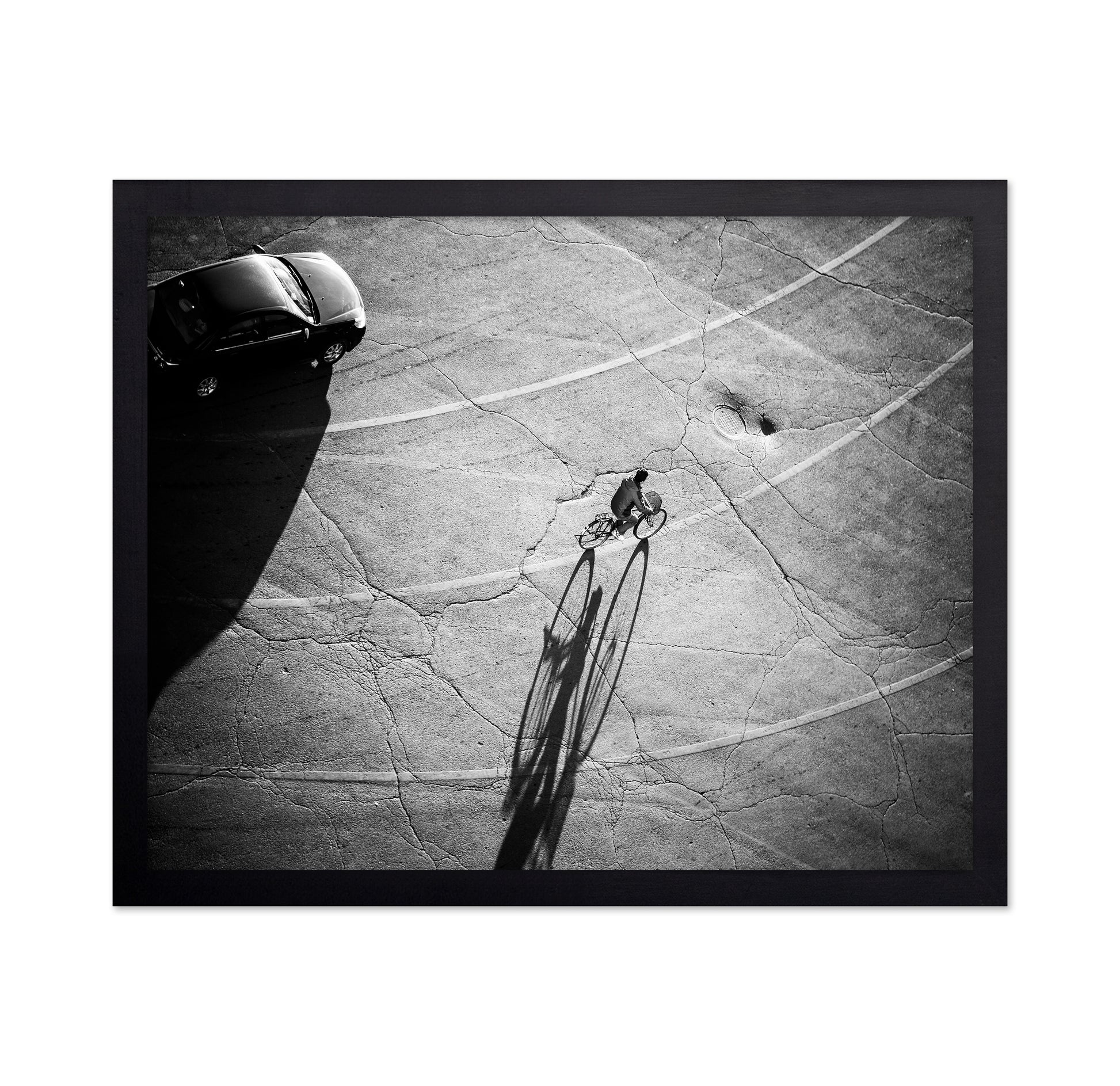 Lone Cyclist Shadow