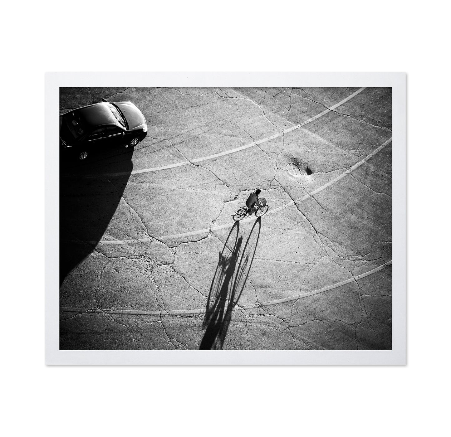Lone Cyclist Shadow