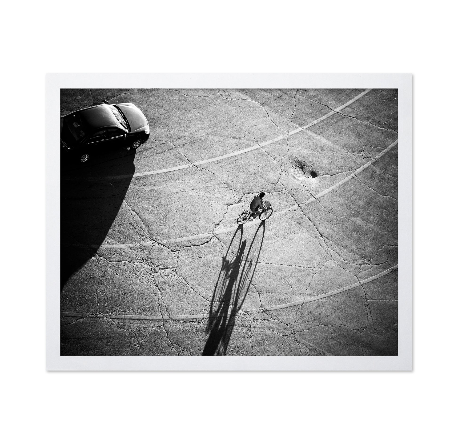 Lone Cyclist Shadow